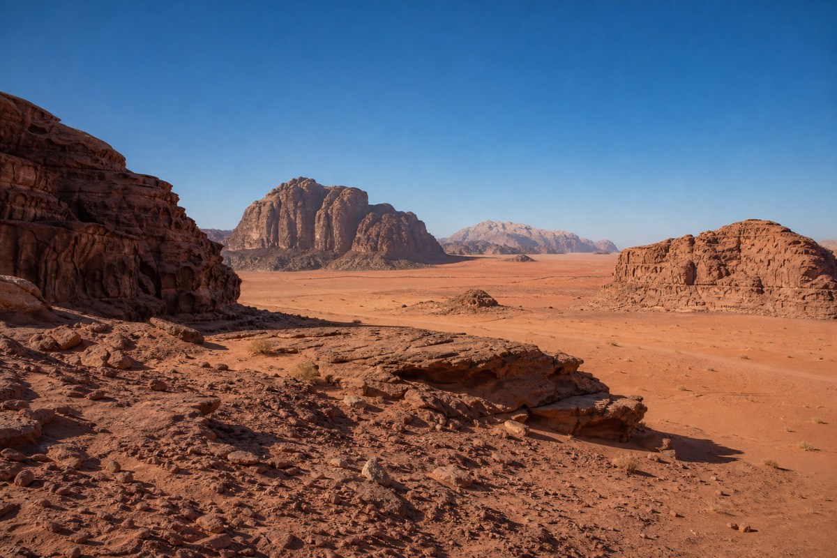 Red sandstone rock formations and open desert in Wadi Rum, the setting used as an alien planet in multiple films